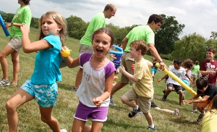 Kids and Counselors with Water Balloons