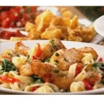 Olive Garden Coupon: Buy One Entree, Get One Half Off