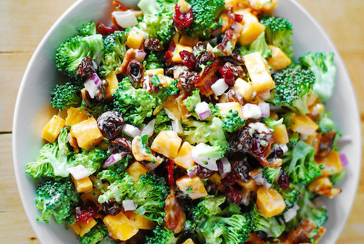 Broccoli salad with bacon, raisins, and cheddar cheese